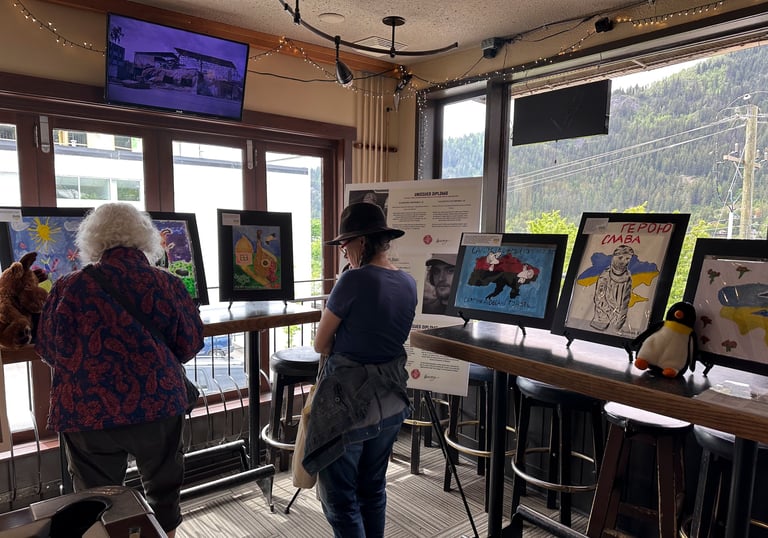 exposition with paintings created by kids in the Ukrainian war shown in Canada