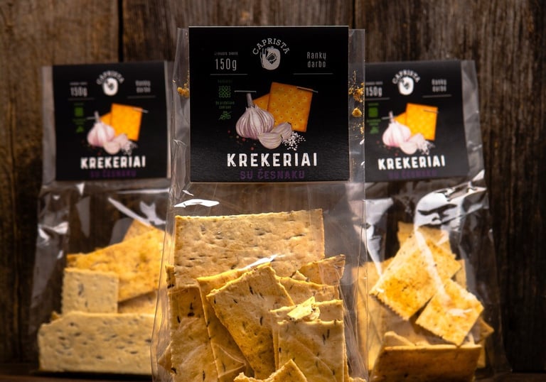 three  bags of crackers  on a table