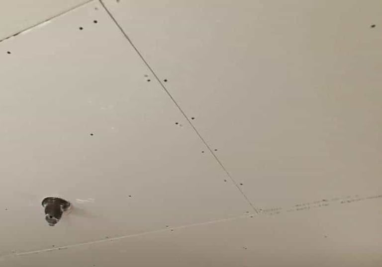 Drywall In Installed over old plaster ceilings in Forest Park Springfield MA