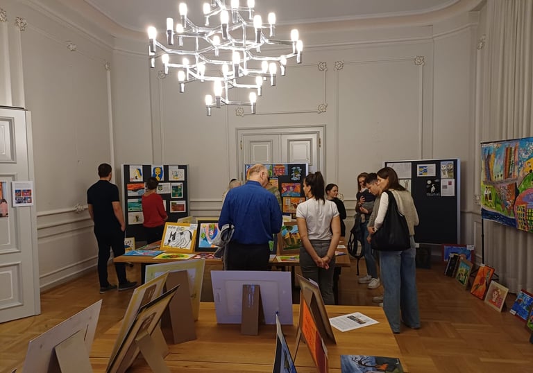People looking at the artwork 