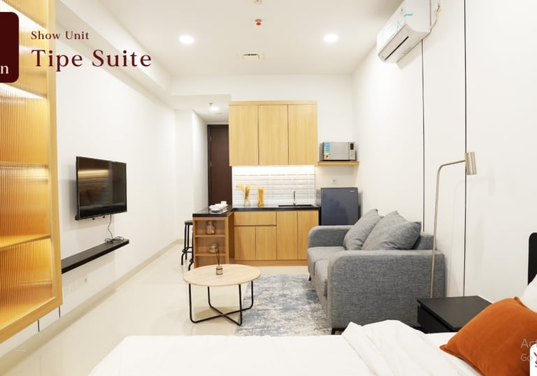 a living room with a couch and a television