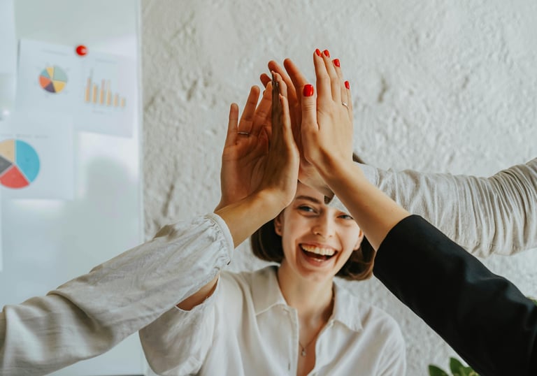 High five for successful Kaizen team