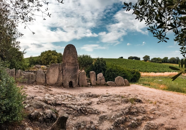 Giants’ Tomb Coddu Vecchiu in Arzachena with Capichera vineyards, Sardinia