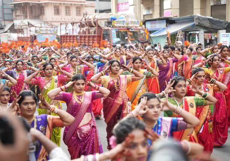 women in maharastrian traditional outfit performing in girgaon gudipadwa shobhayatra 2025