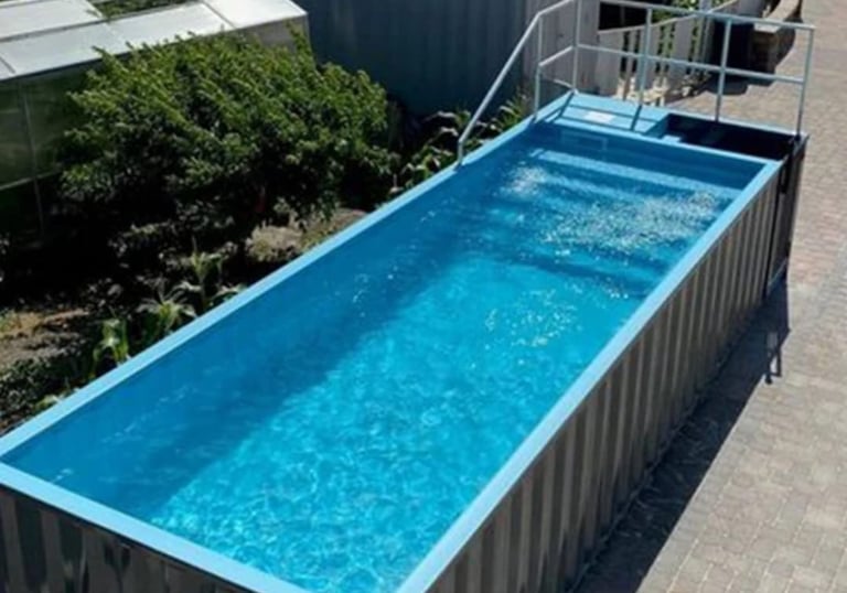 a container container pool with a ladder and a ladder