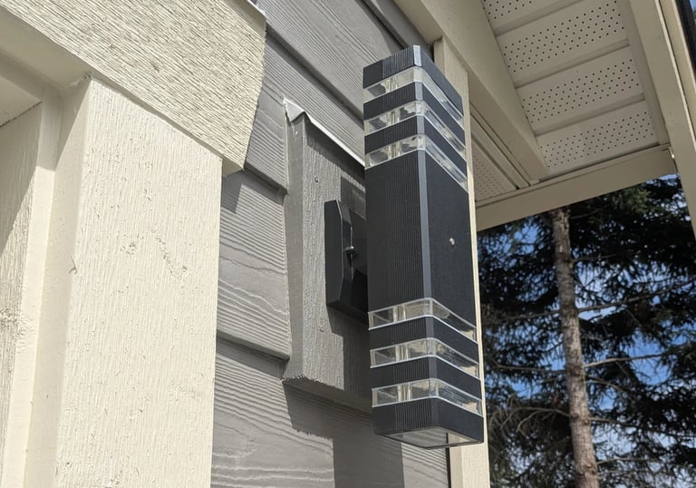 Siding and exterior light with weatherproof sealing and careful trim painting