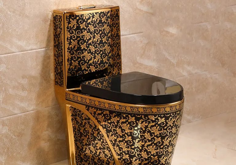 a toilet with a black and gold toilet seat cover