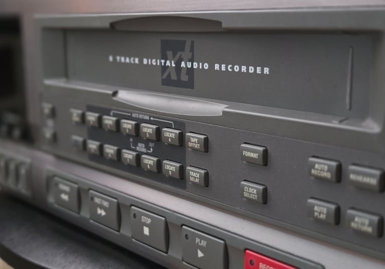 An 8 track ADAT tape transferring machine.
