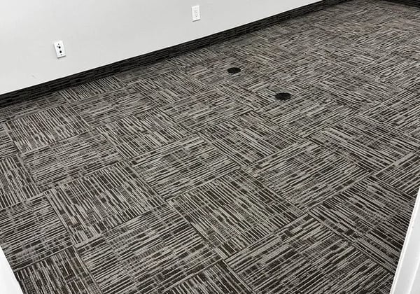 Grey commercial carpet tile installed in conference room in Downtown London Ontario, durable flooring solution