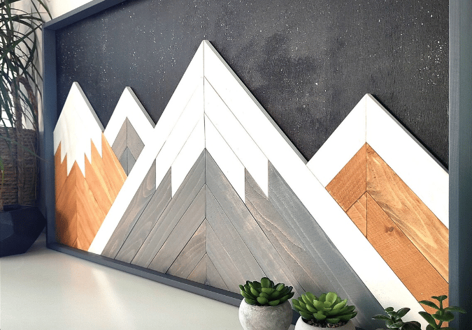 Quadro-legno-montagne-geometrico