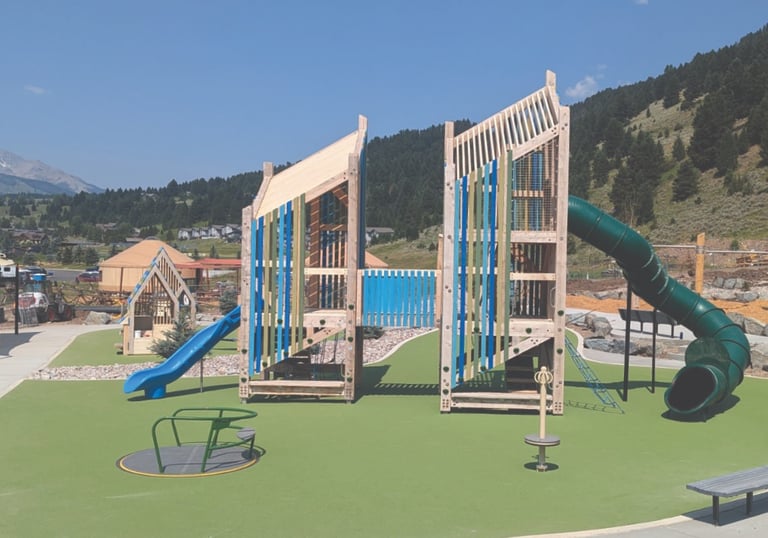 a street sign on a street with a sky background