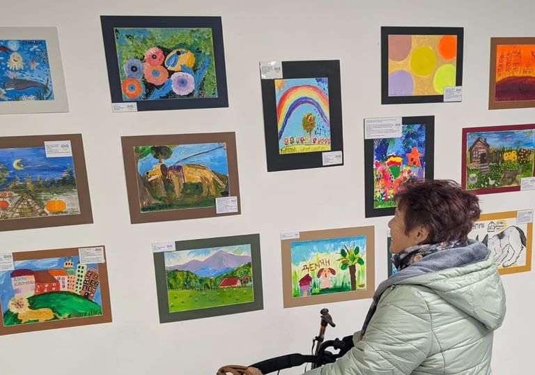 person looking at the artwork