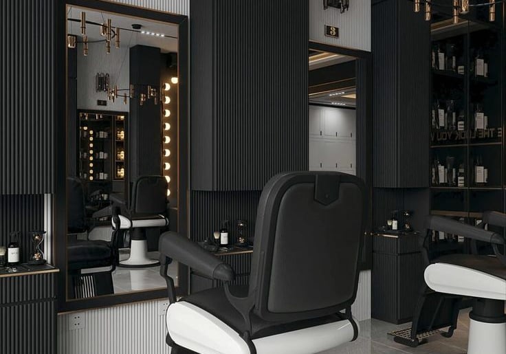 a salon chair in a salon with a chandelier