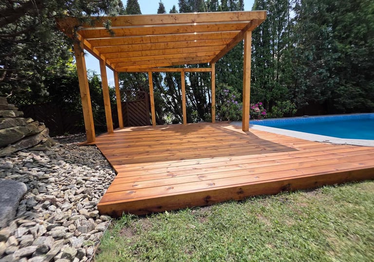 a wooden deck with a pergolized decking and a pergolized deck