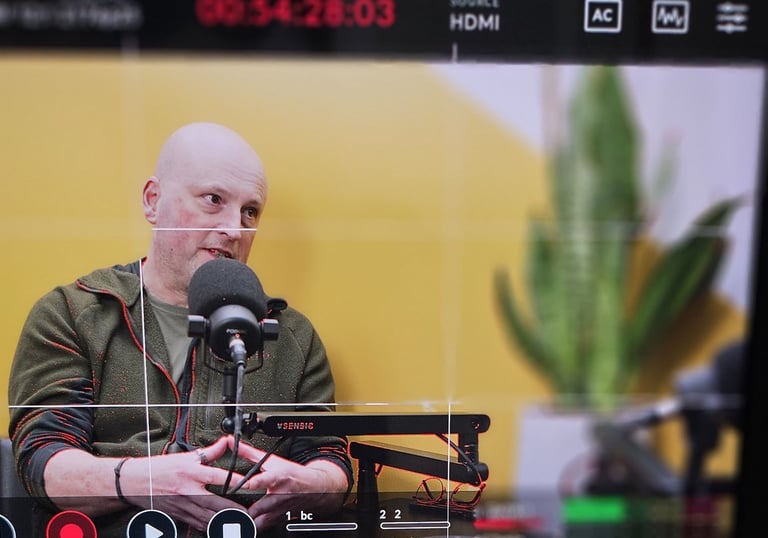 Shot of podcast guest through video monitor