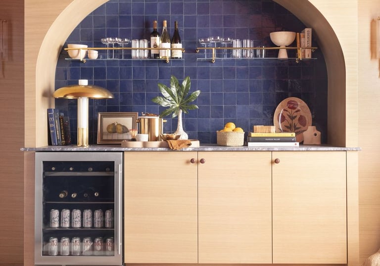 a kitchen with a blue tile floor and a red tile floor