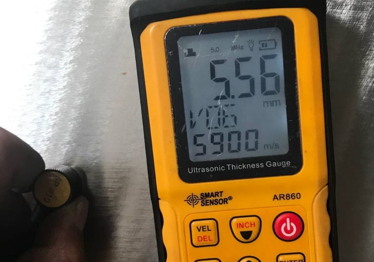 Ultrasonic thickness testing on ISO tank during inspection