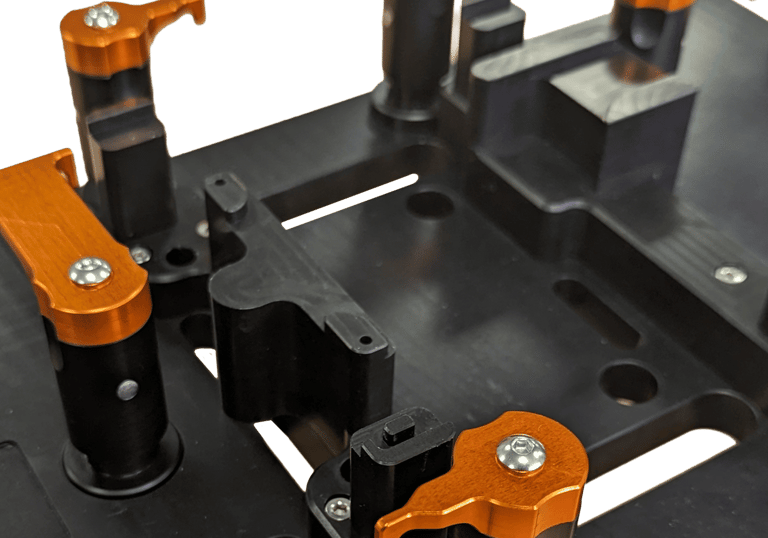 Metrology fixture for clamping various medical components in a single tool.