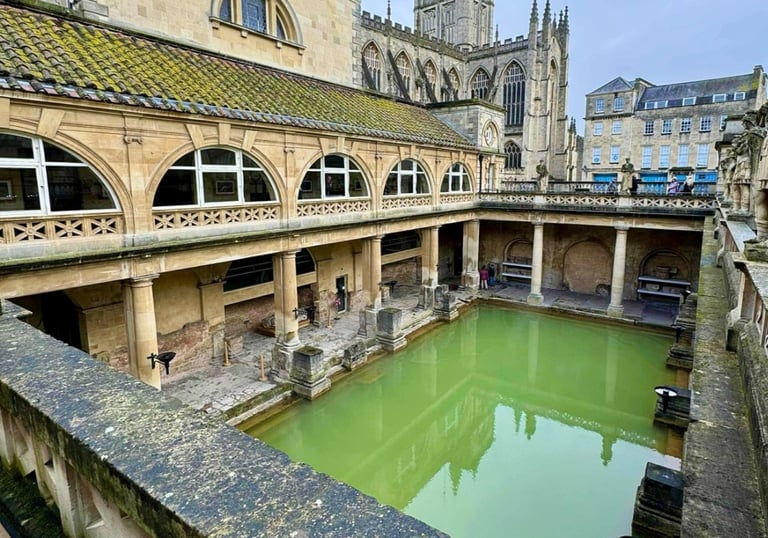 Roman Baths in Bath with reflections in the water