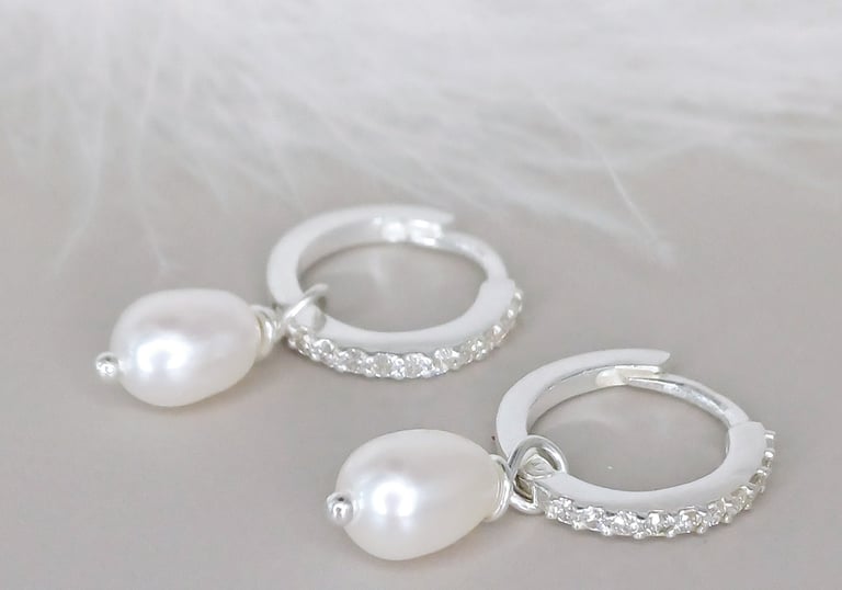 sterling silver zirconia hoop earrings with a delicate pearl charm - elegant and timeless design