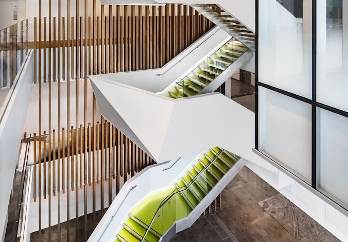 Portrait photo showing the other green modern feature stairs at Deloitte, by Pengelly Iron Works