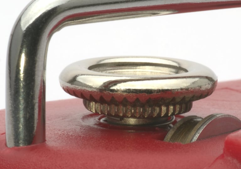 Close up of a tin opener.