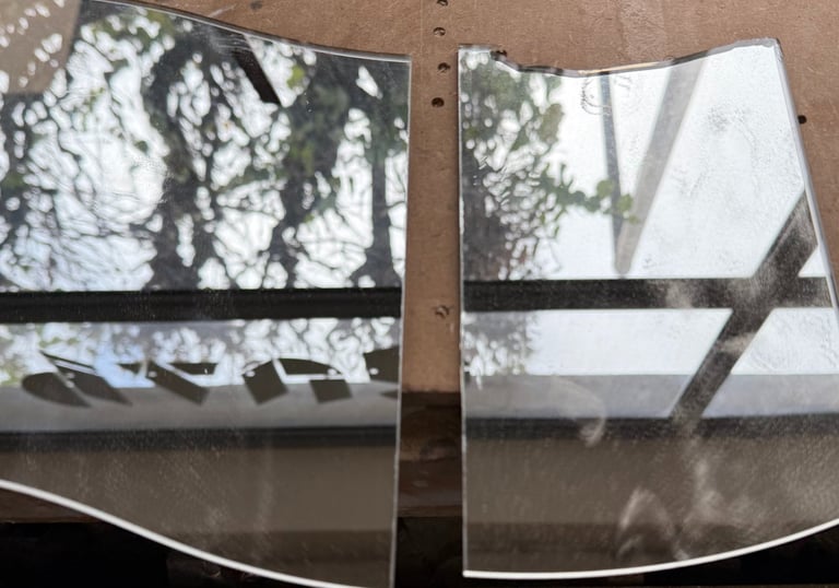 two mirrors with a window in the middle