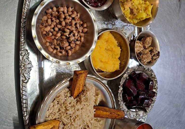 Hare Krishna Prasadam offering tray with vegetarian food in each section