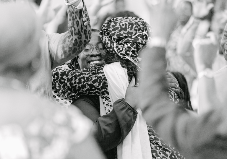 Two women hugging