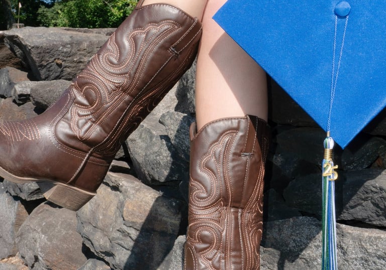 Cowboy boots and a graduation cap photo