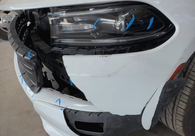 Crashed Dodge Charger at CarGo Collision Center Houston Auto Bodyshop