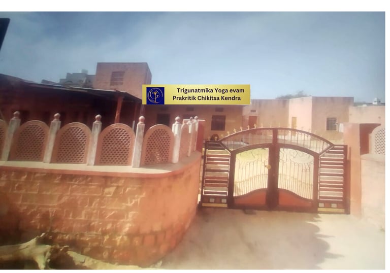 a gated entrance to a building with a sign that says,'welcome to
