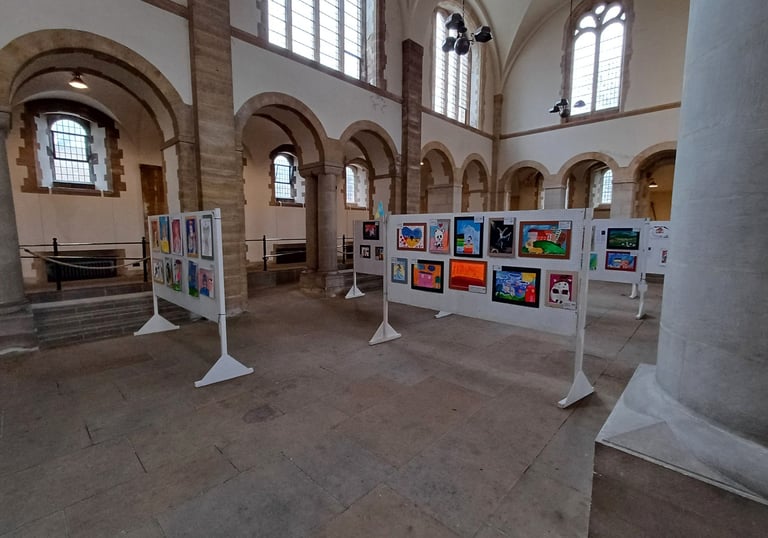 Large event showing paintings by children affected by war