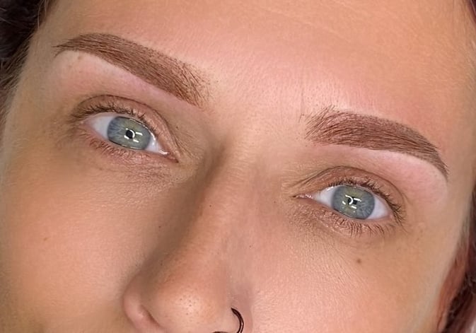 Healed result of a soft powder ombre brow by Effortless Brow PMU Studio.