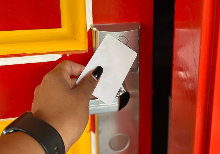 a person holding a card and a card in their hand