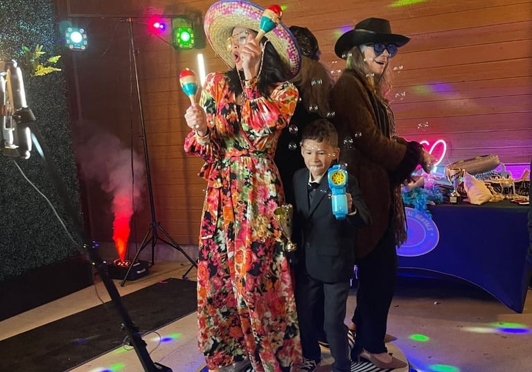 Family on a 360 video booth having fun
