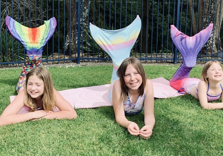 three Mermaids at a Merventure Mermaid class