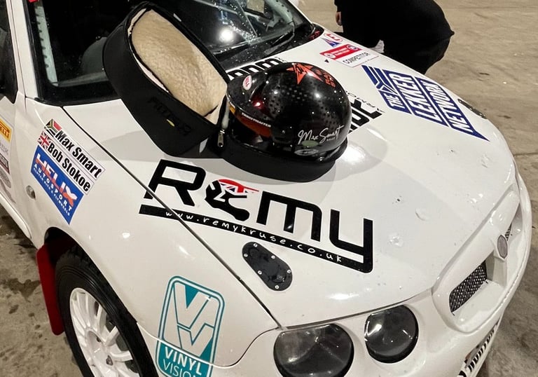 a rally car with a helmet on it