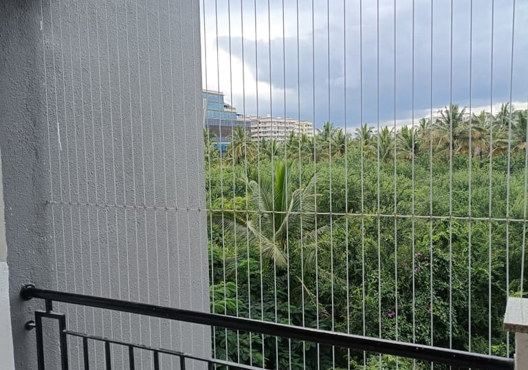 invisible grills installed in bengaluru by sukumari safety nets