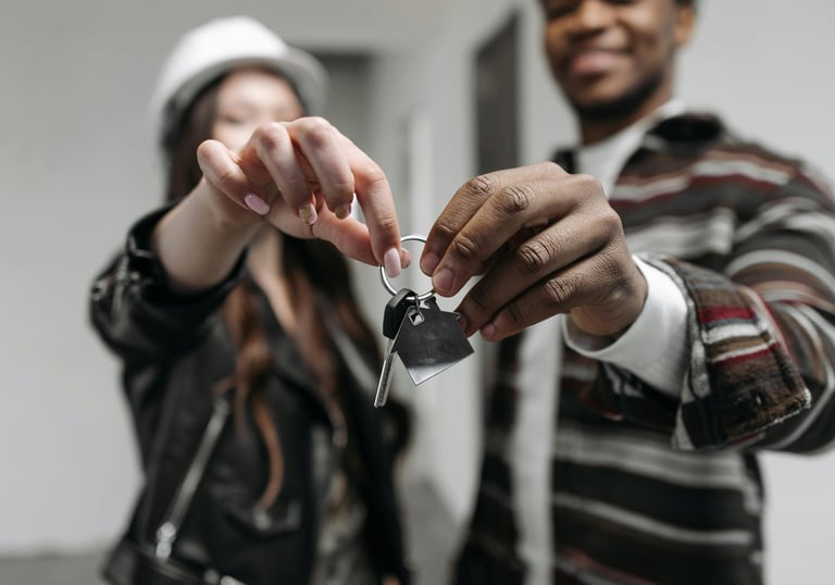 Photo by Pavel Danilyuk: https://www.pexels.com/photo/a-couple-holding-their-house-key-7937959/
