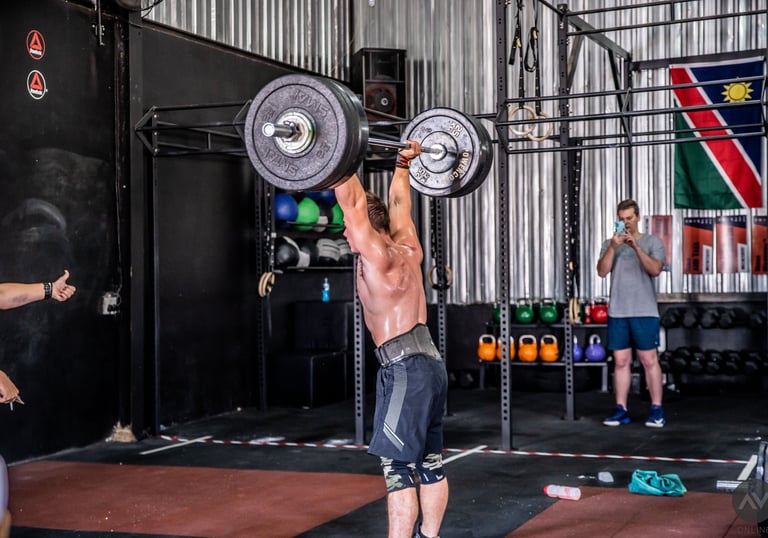 Professional athlete performing an Olympic lift