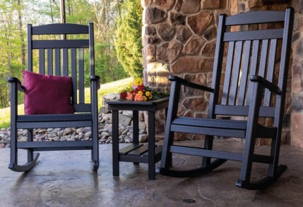 High-quality rocking chairs with matching table on front porch
