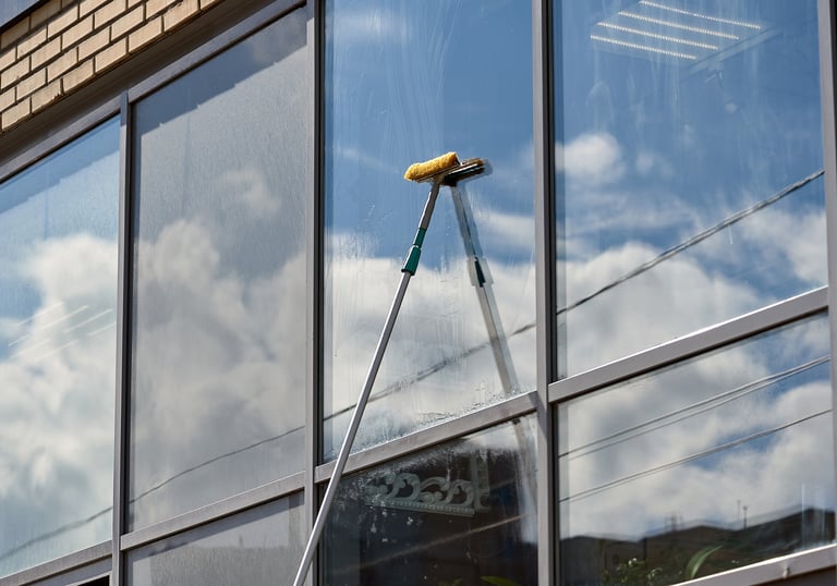 washing tall commercial windows in naples