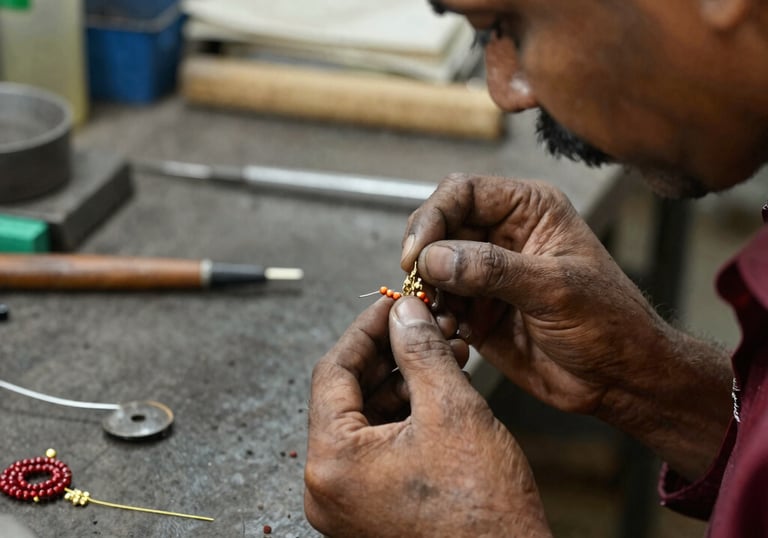 Artisan’s hands carefully polishing a bracelet, highlighting the dedication behind every piece