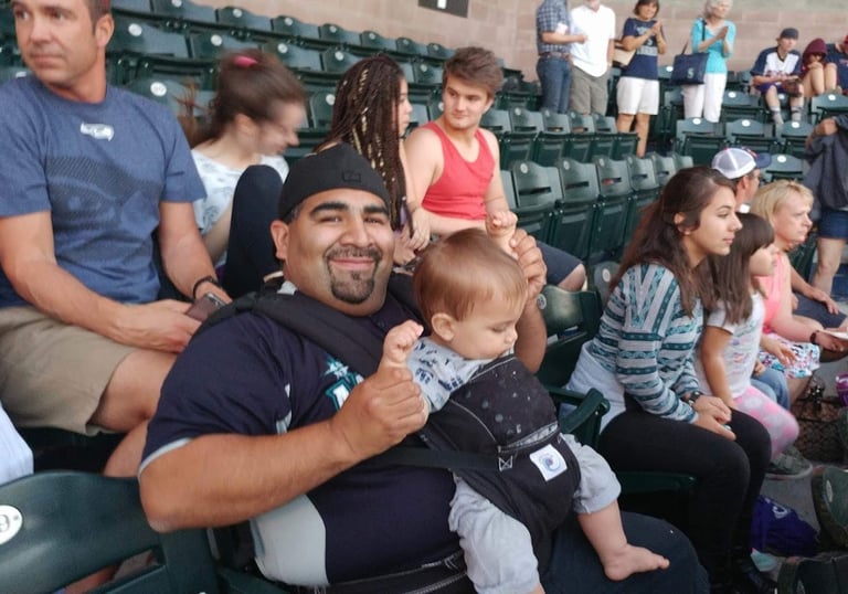 Joke Daddy at a baseball game with family