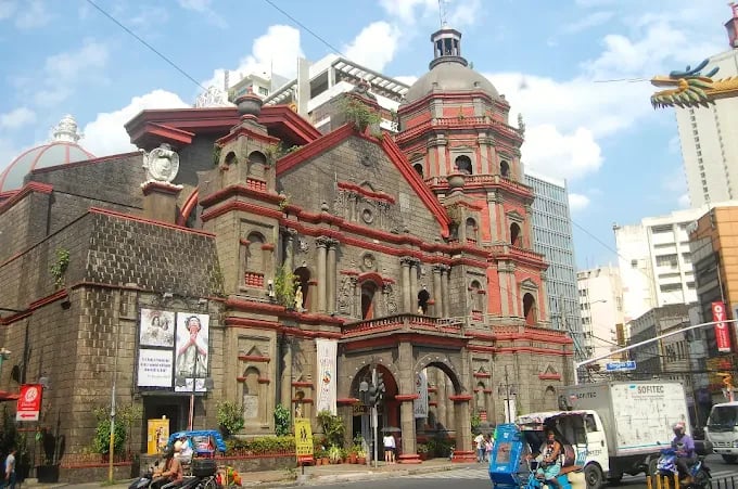 a large building with a clock tower in the middle of it