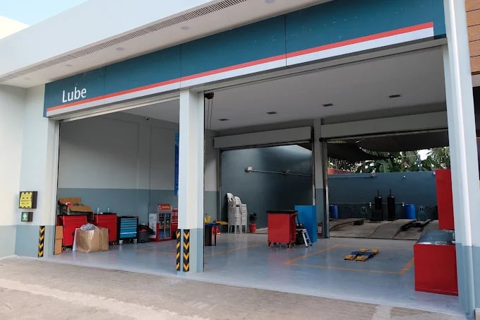 a garage with a lot of furniture and a lot of furniture