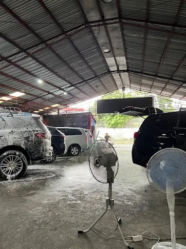 a car washer is parked in a garage