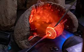 Handcrafting Murano glass beads in Venice, Italy