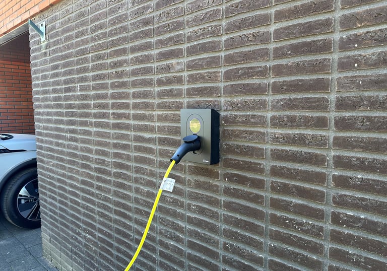 A wall-mounted Zaptec Go 2 EV charging station.